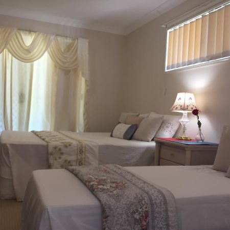 Theme Parks Amituofo Homestay Gold Coast Habitación foto