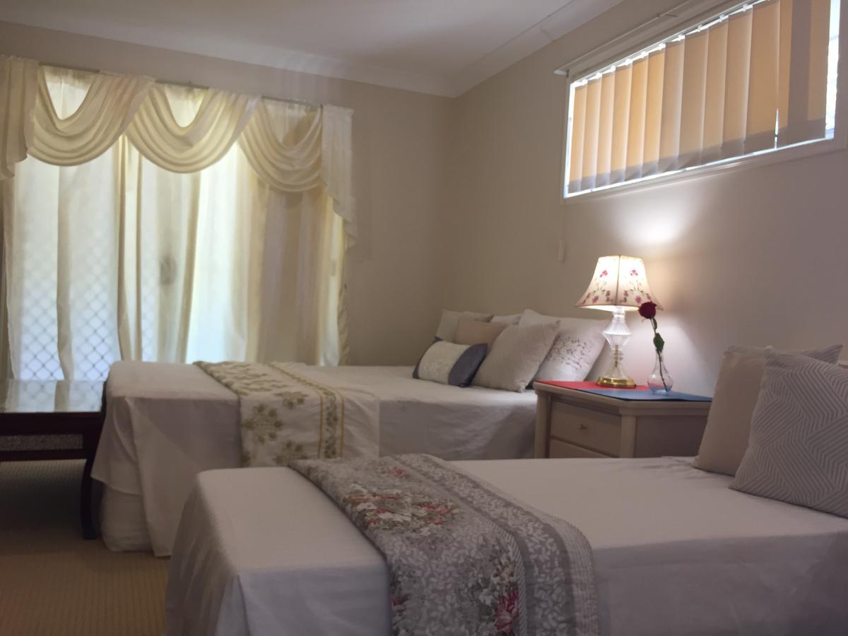 Theme Parks Amituofo Homestay Gold Coast Habitación foto