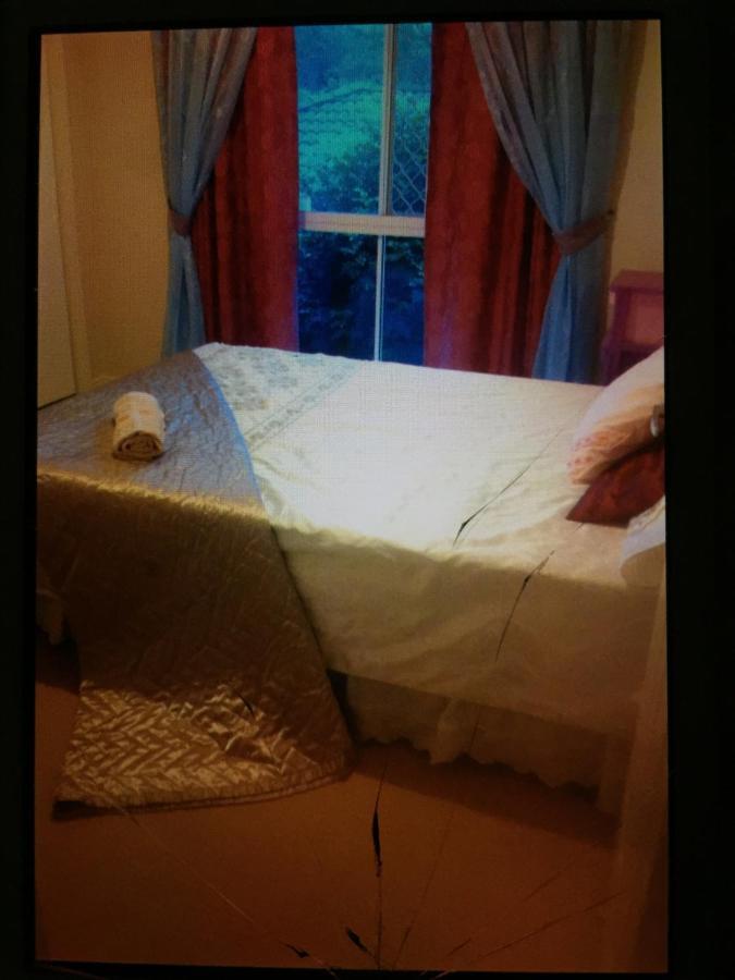 Theme Parks Amituofo Homestay Gold Coast Habitación foto